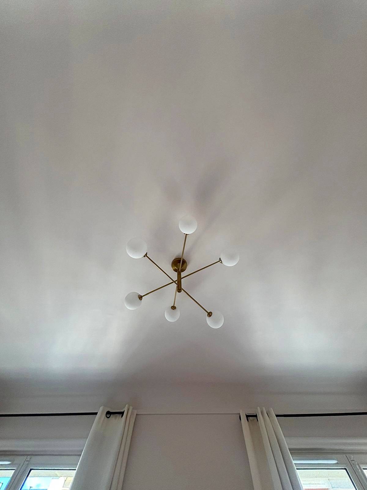 Lustre Cassius with 6 white glass globes and gold metal.