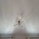 Lustre Cassius with 6 white glass globes and gold metal.