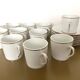 Coffee service with 11 cups and 6 saucers made of Limoges porcelain.