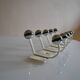 Vintage 1970s wall-mounted coat rack with 10 hooks