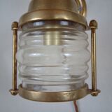 Vintage wallmounted brass lamp from a ship.