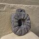 Brutalist mirror in hand-carved natural stone