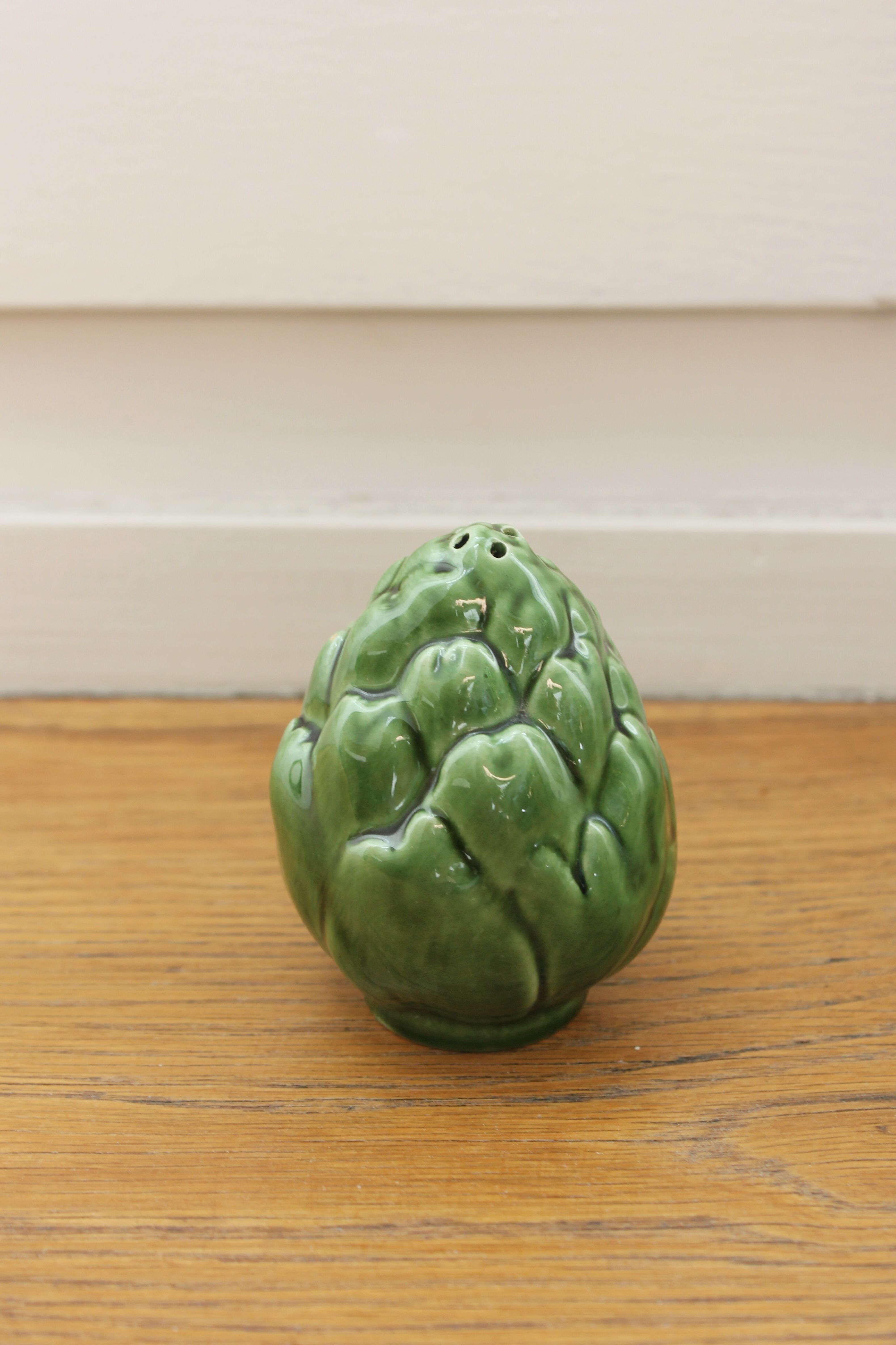 Artichoke salt shaker in vintage slurry