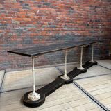 Decorative console table in cast iron and wood