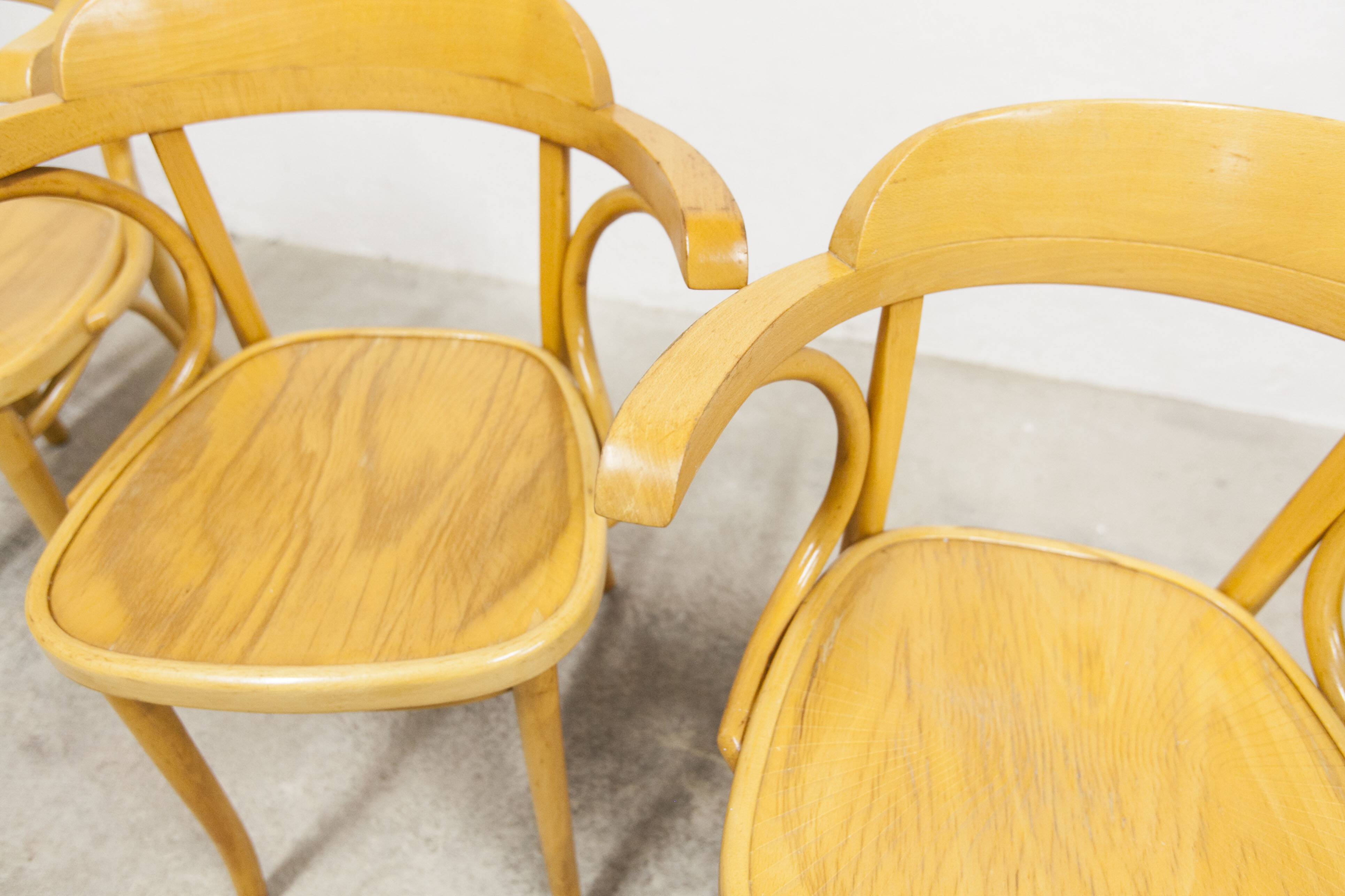 Set of 4 bistro armchairs with armrests from the 1960s.