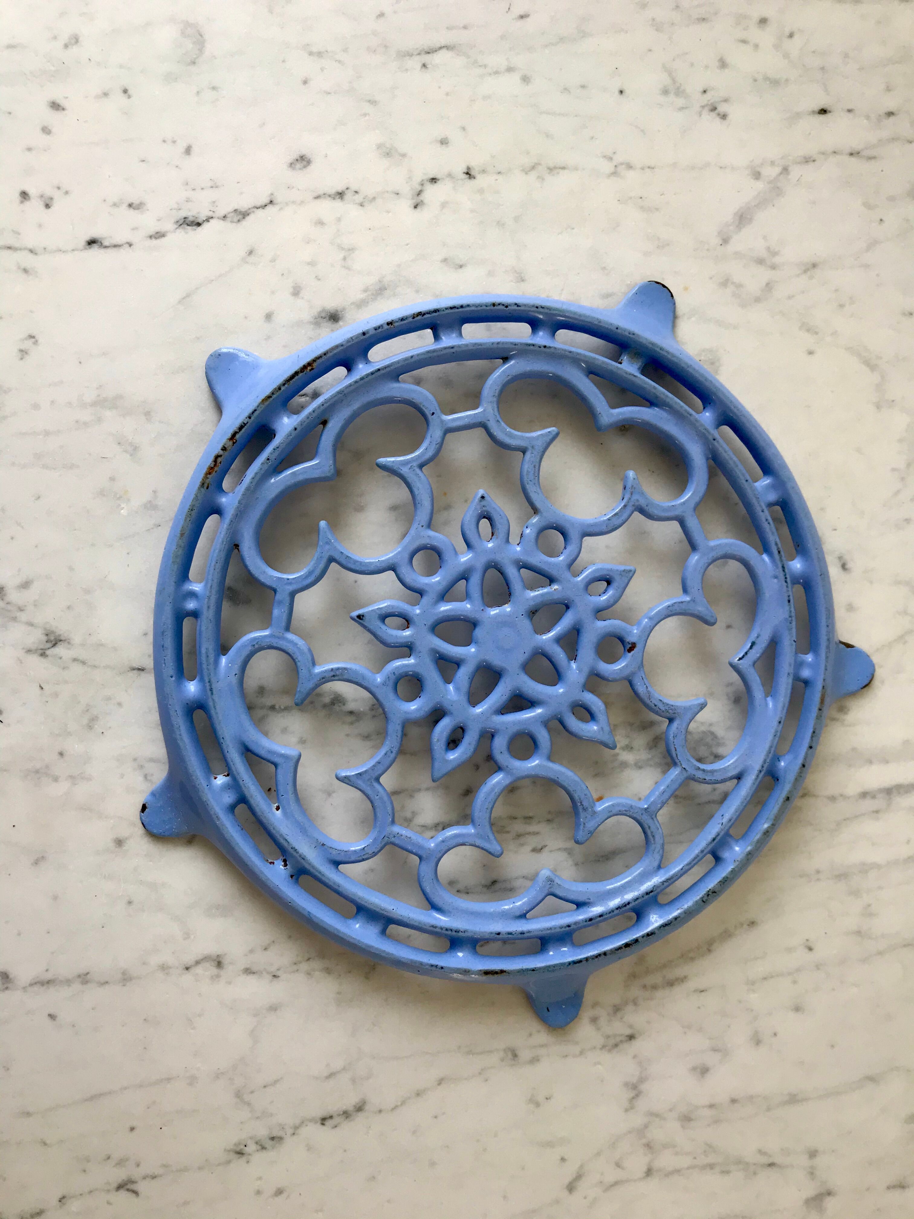 Cast iron coaster painted sky blue early twentieth century