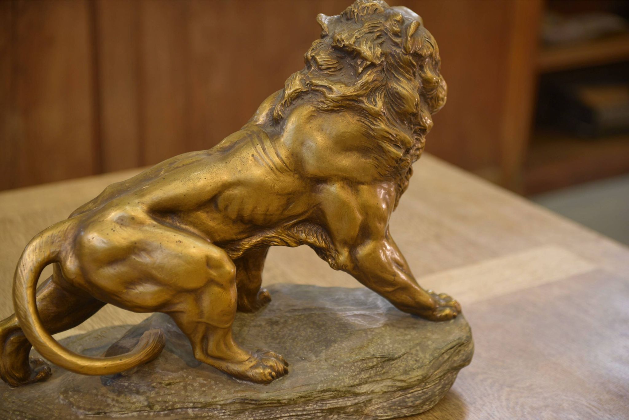 Sculpture of a lion in patinated terracotta by A. Fagotto, 1930s.