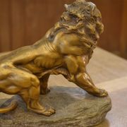 Sculpture of a lion in patinated terracotta by A. Fagotto, 1930s.