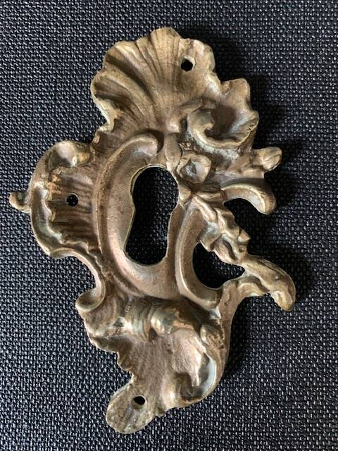 Pair of rocaille bronze keyholes from the 19th century