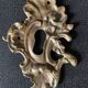Pair of rocaille bronze keyholes from the 19th century