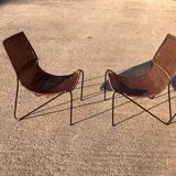 Pair of rattan and steel armchairs