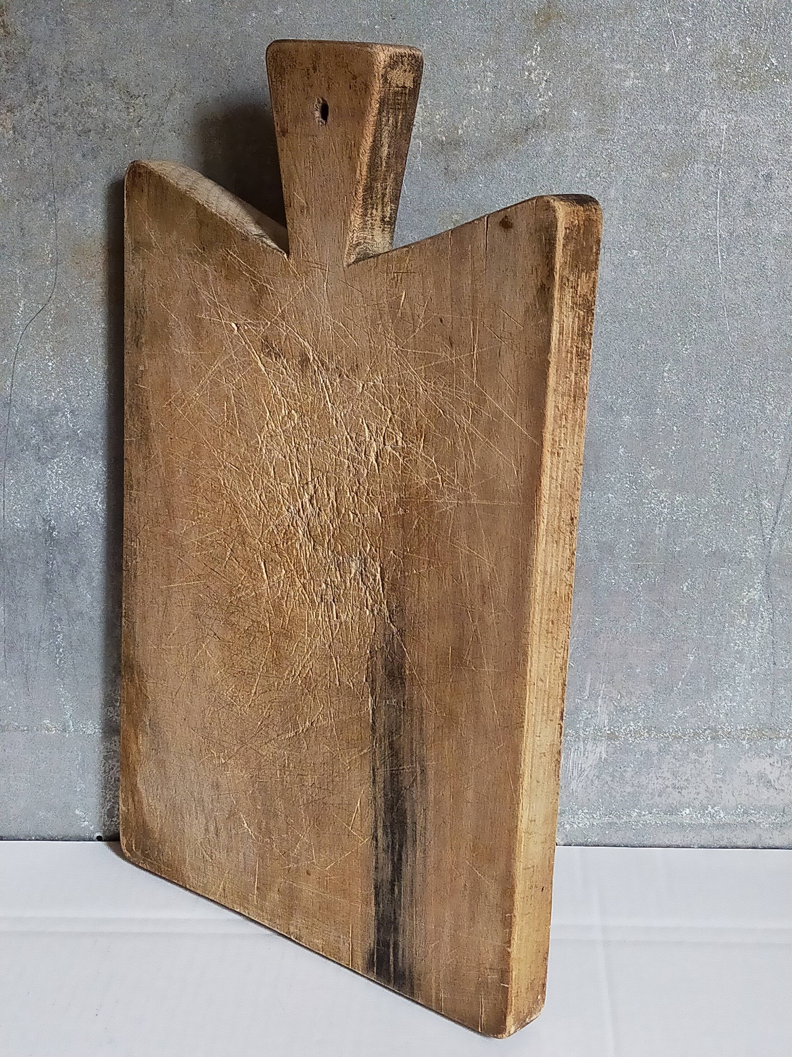 Cutting board in old solid wood