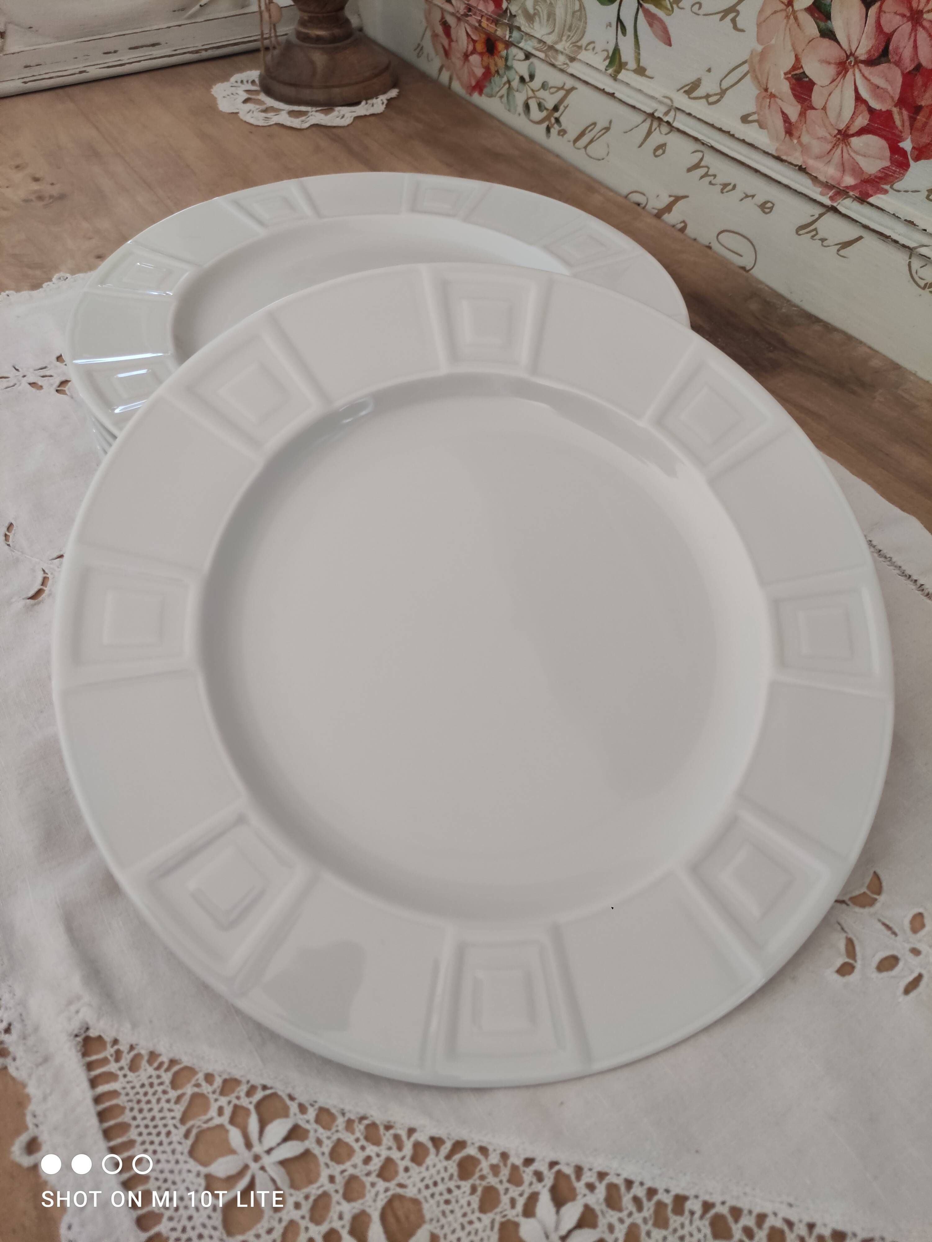 Set of 7 flat plates in white Limoges porcelain geometric decoration in relief