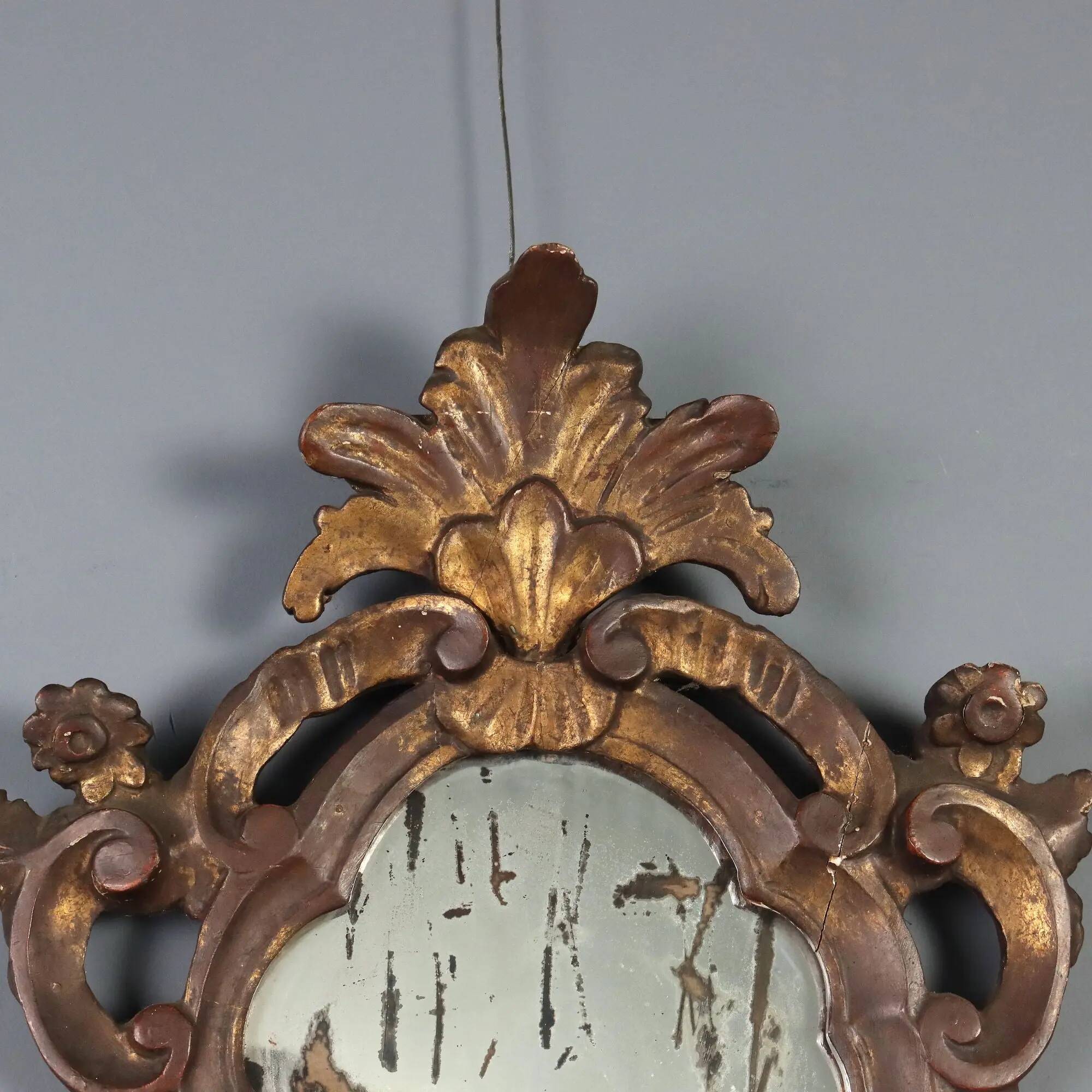Small antique mirrors in carved and gilded wood, Italy, 20th century.