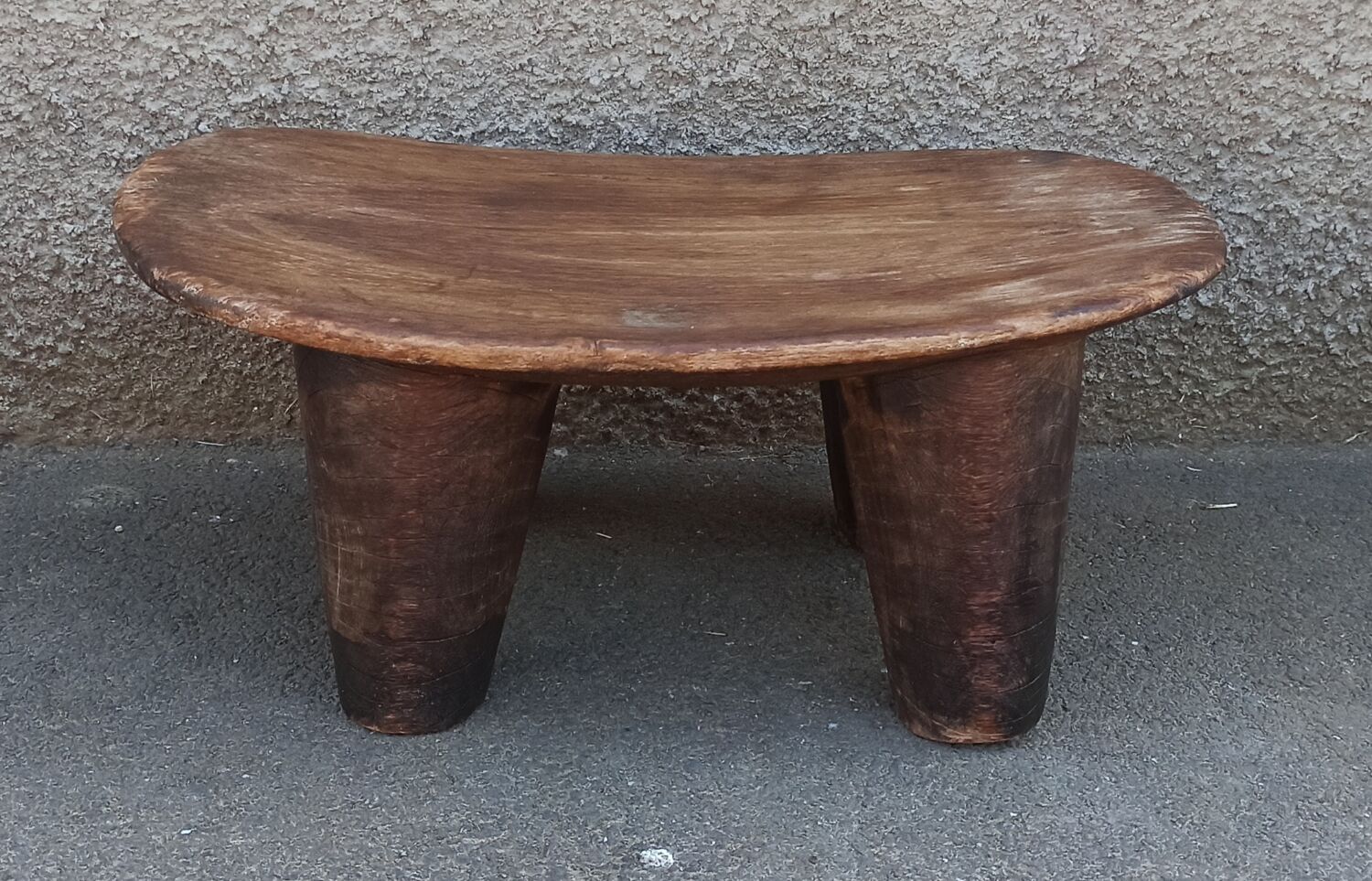 Antique wooden stool. Senufo African art from Côte d'Ivoire.