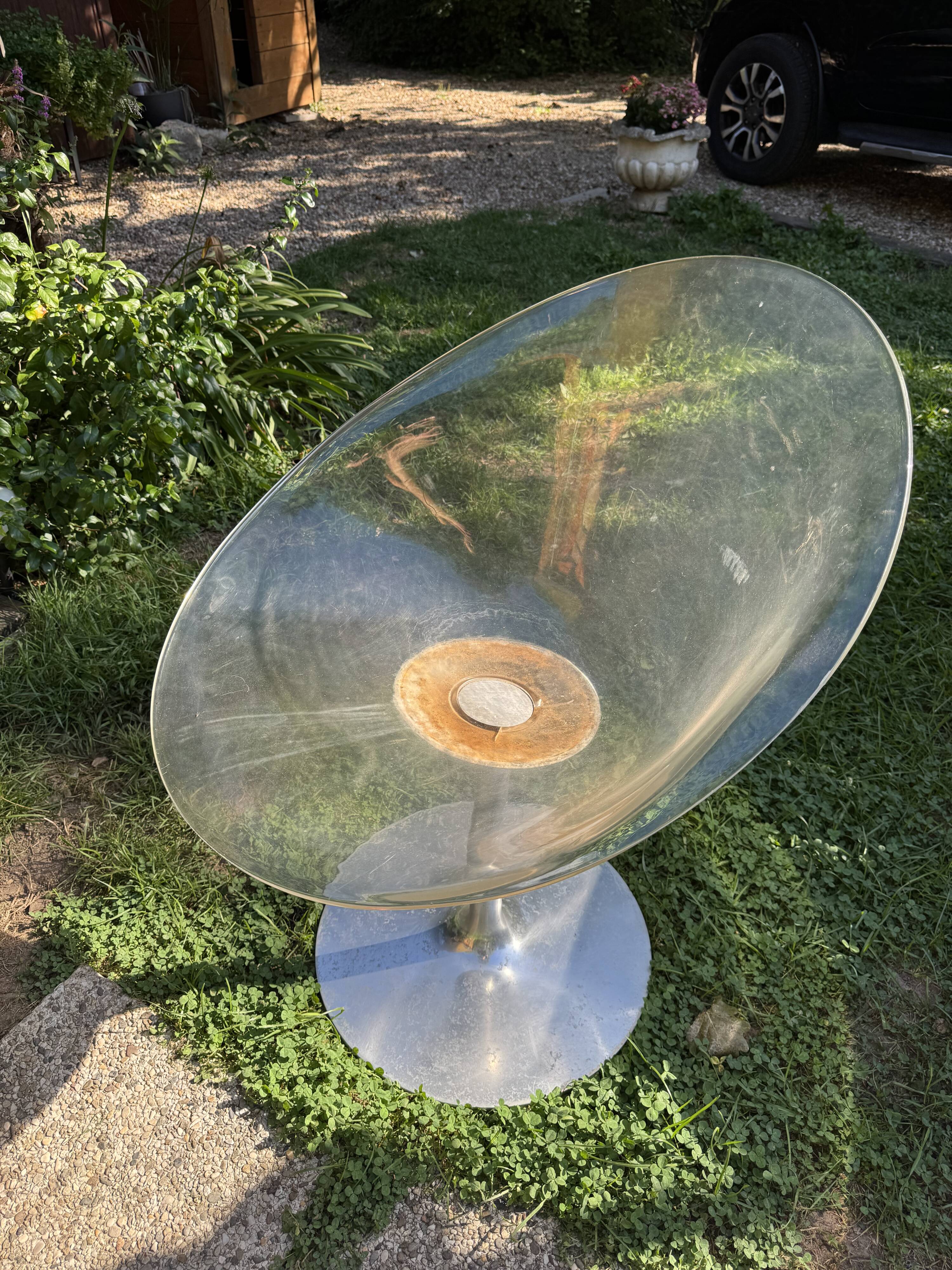 Transparent swivel armchair "Eros" by Philippe Starck for Kartell