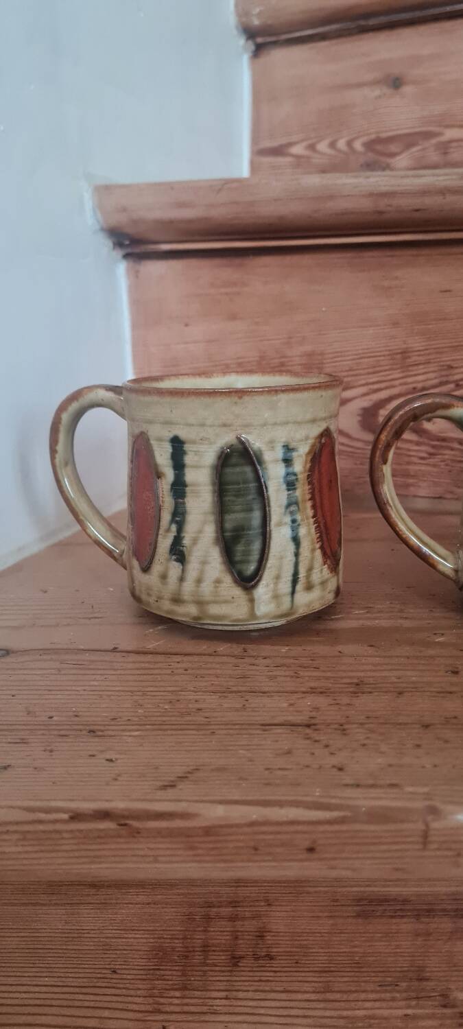 Glazed stoneware mugs from the 60s