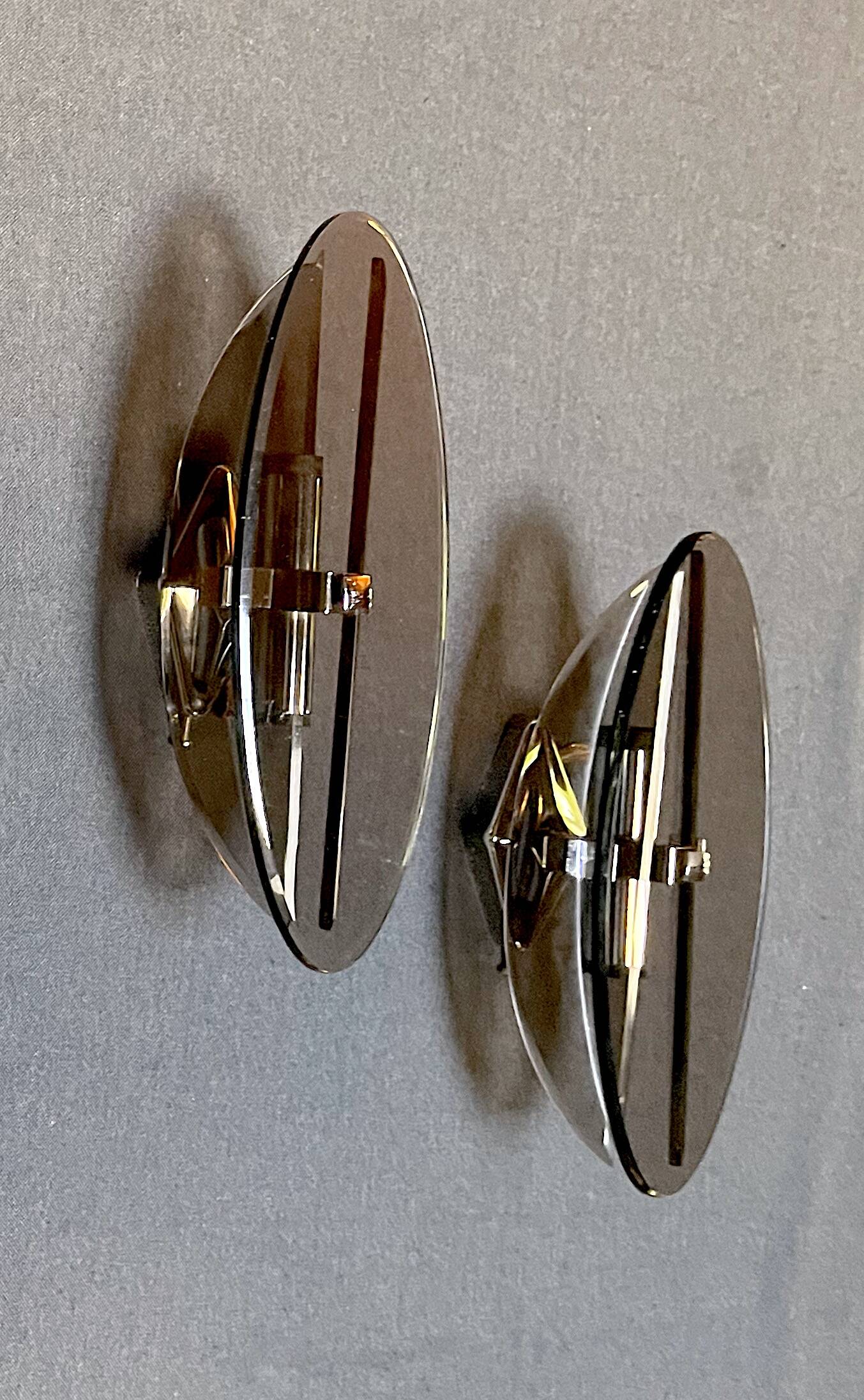 Veca, Pair of smoked glass and chrome wall lights, Italy 1970s