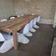 10 white chairs in the style of Verner Panton