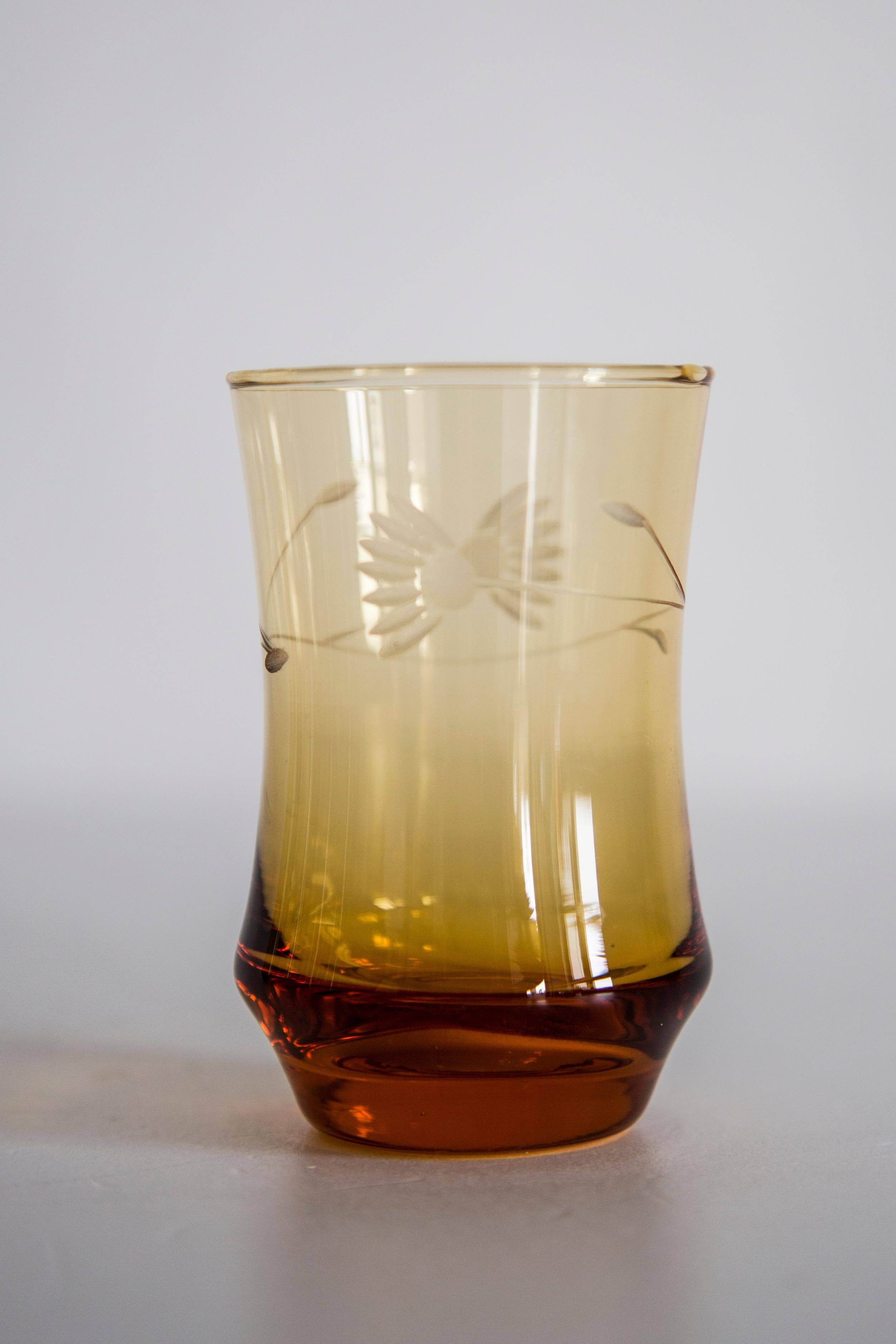 Set of six mid-century glasses and yellow Murano pot, Europe, 1960s.