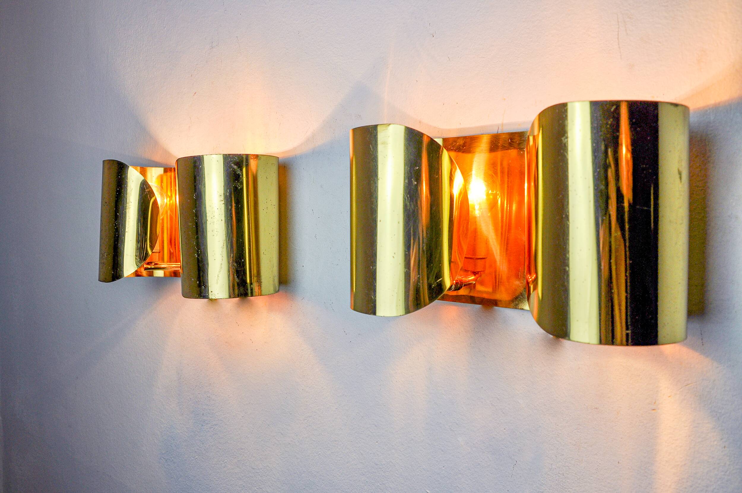 Pair of "Foglios" brass wall lights, Italy, 1970