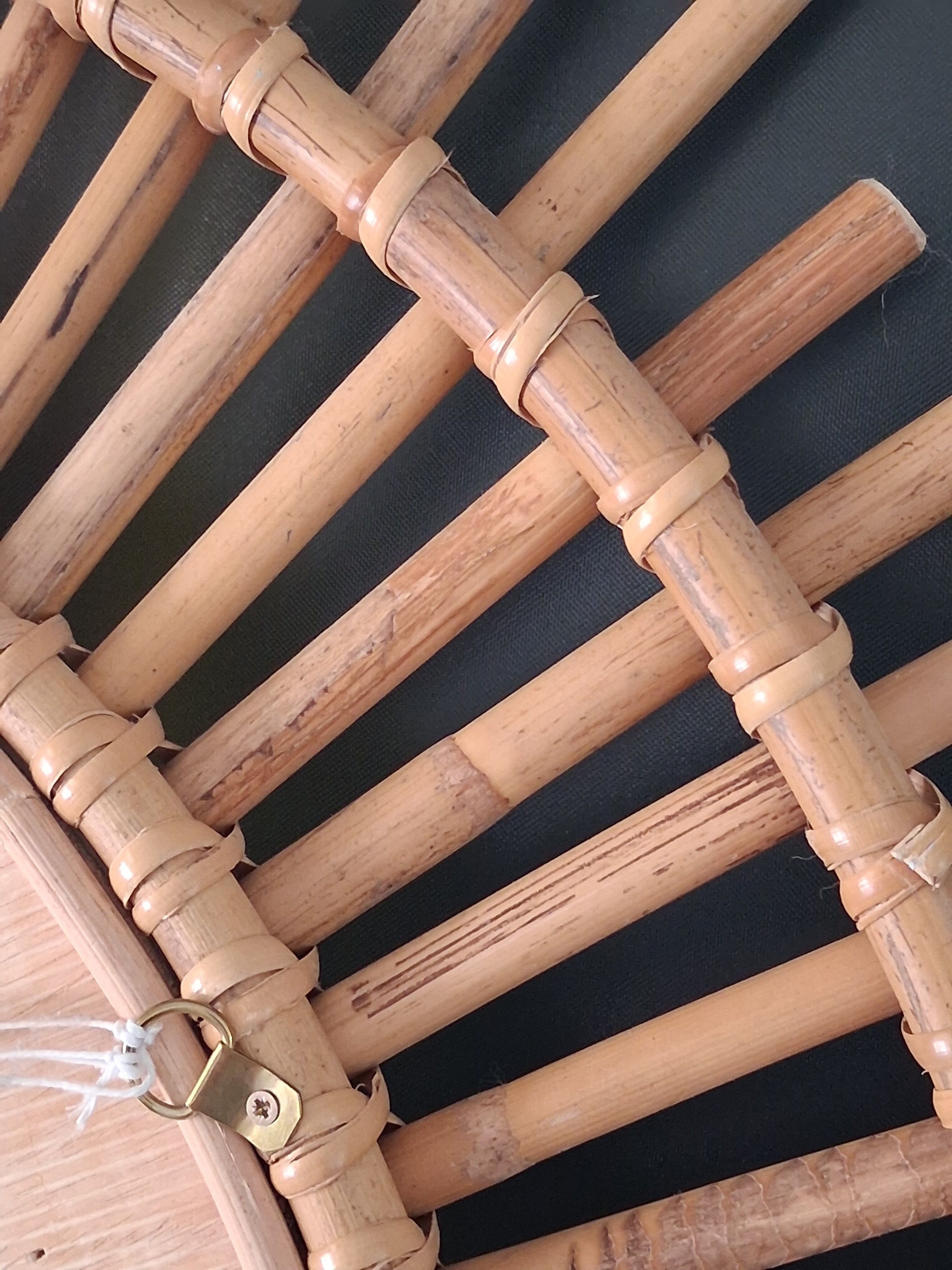 Very large sun mirror in rattan.