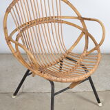 Rattan shell armchair with armrests