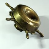 1960s solid brass ashtray in the shape of a steering wheel with a candle stick, vintage