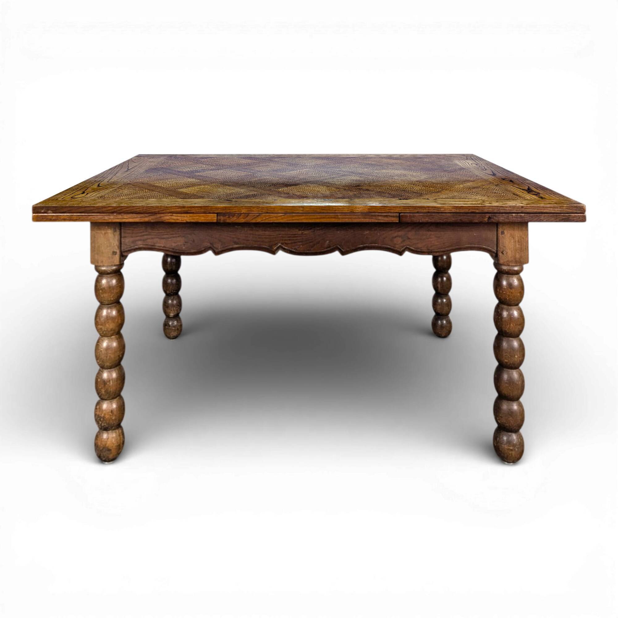 Dining table with turned oak legs.