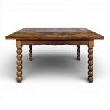 Dining table with turned oak legs.