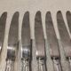 12 silver-plated table knives by Christofle Vendôme, 24.5cm