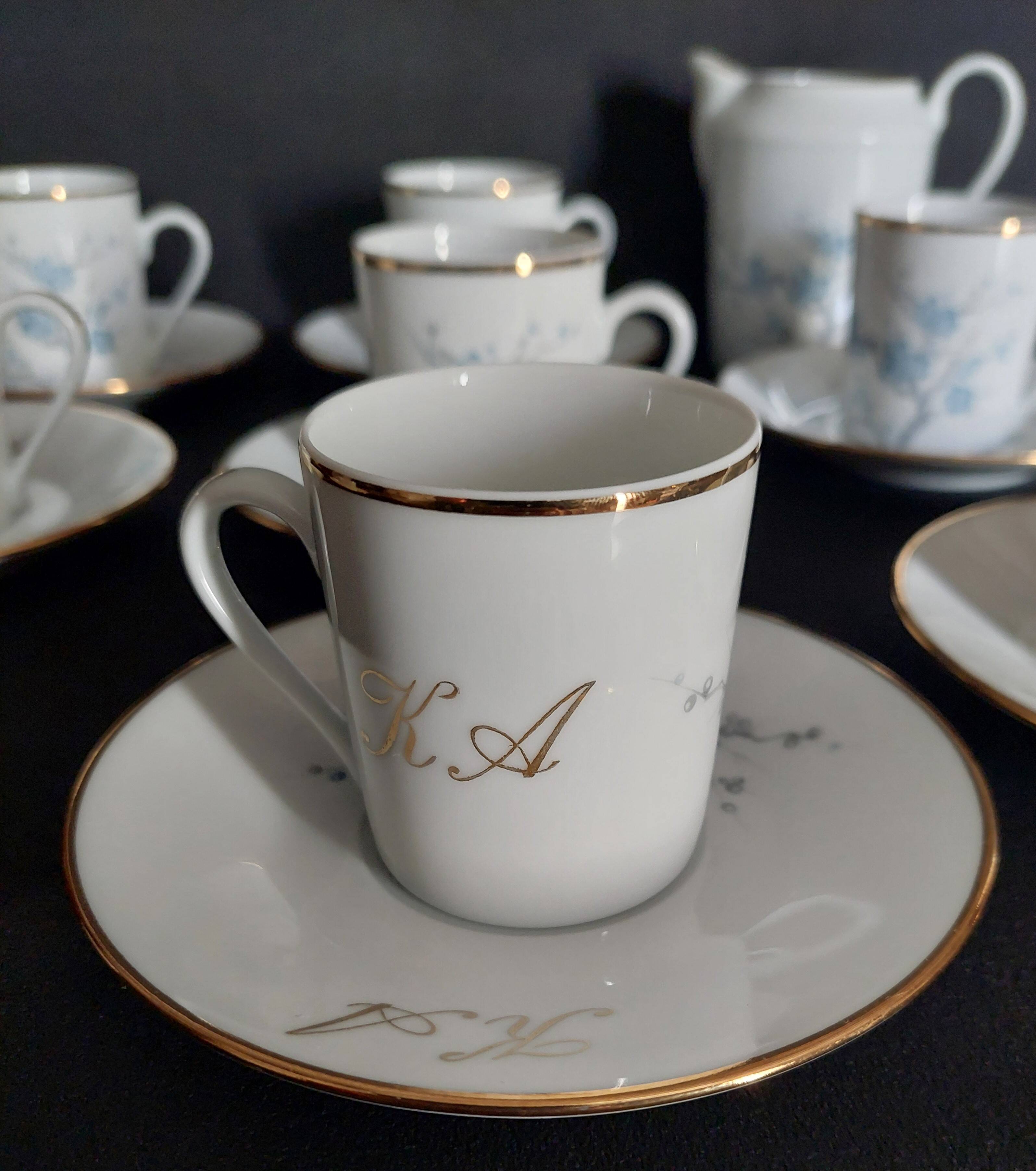 Eight-cup coffee service and creamer, Limoges porcelain, monogrammed