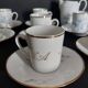 Eight-cup coffee service and creamer, Limoges porcelain, monogrammed