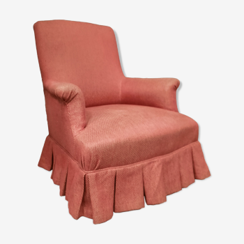 Pink upholstered toad armchair