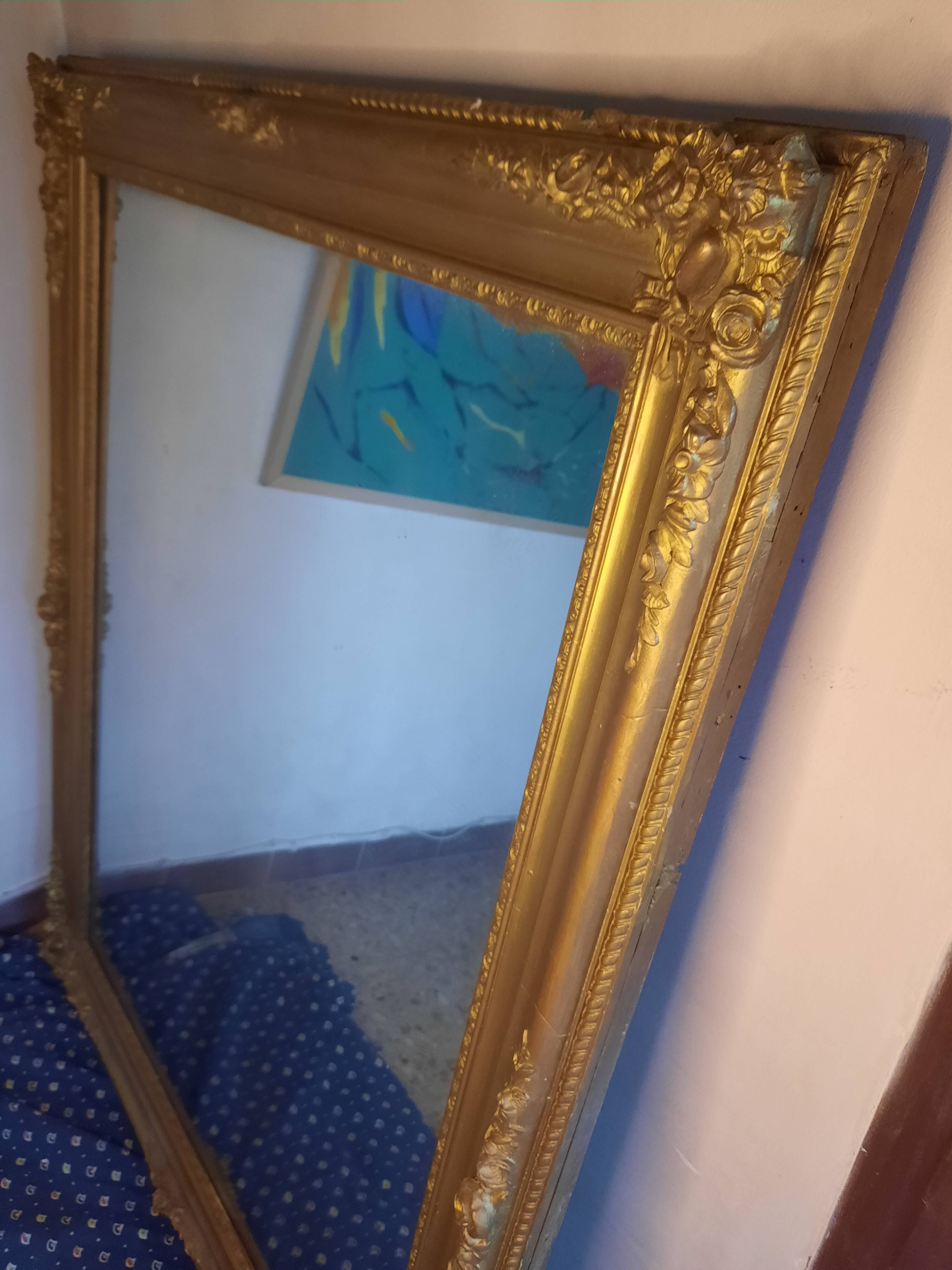 Very large gold mirror