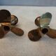 Pair of vintage propeller shape brass candle holders