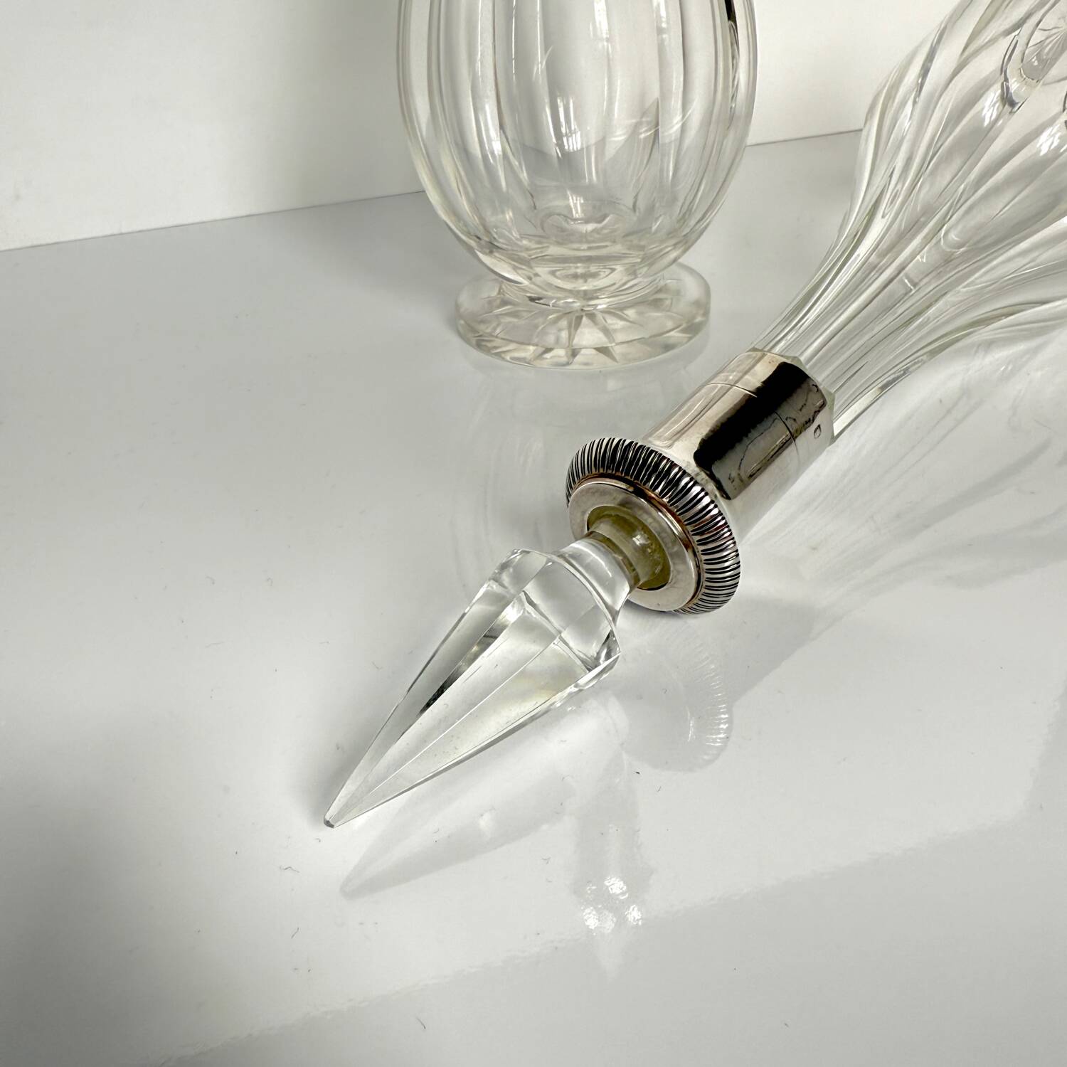 Pair of crystal decanters with solid silver mounts