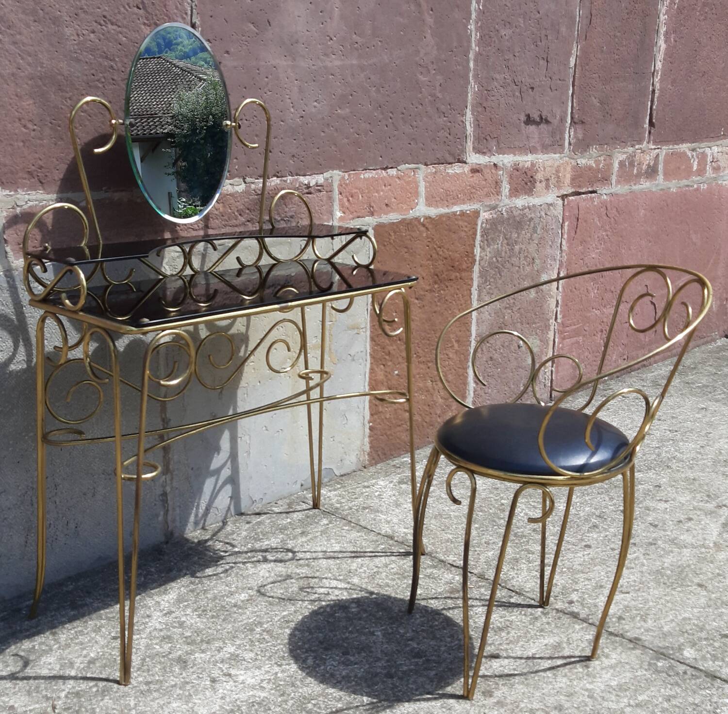 Dressing table and chair in gilded metal and opaline glass.