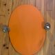 Adjustable oval beveled mirror