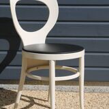 6 baumann chairs, white gull with black faux leather.