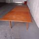 Scandinavian type table with integrated extension
