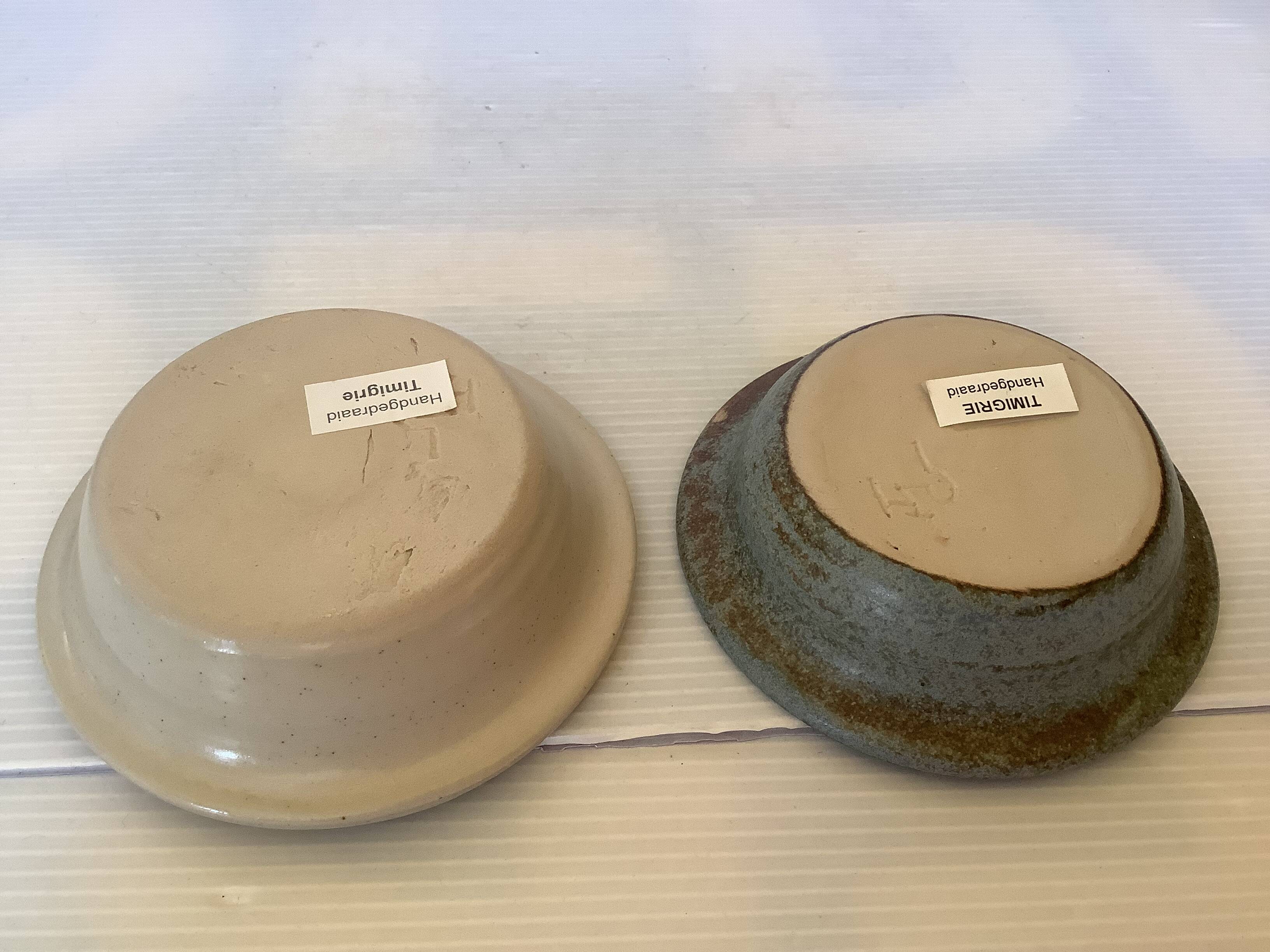 Pair of beige and blue ceramic candlesticks