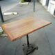 Bistro side table in oak and cast iron