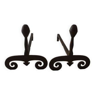 Pair of old cast iron fireplace andirons with pretty arabesques