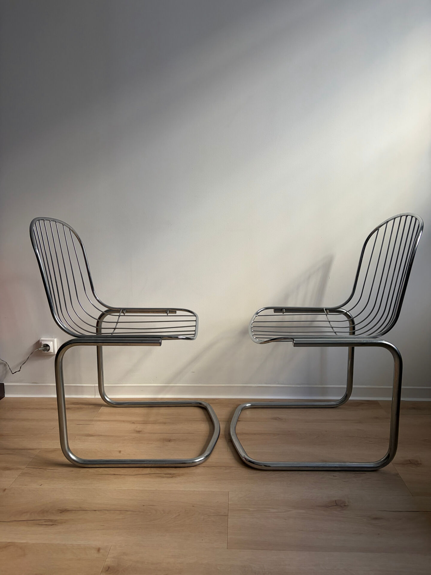 Pair of G. Rinaldi metal/chrome chairs