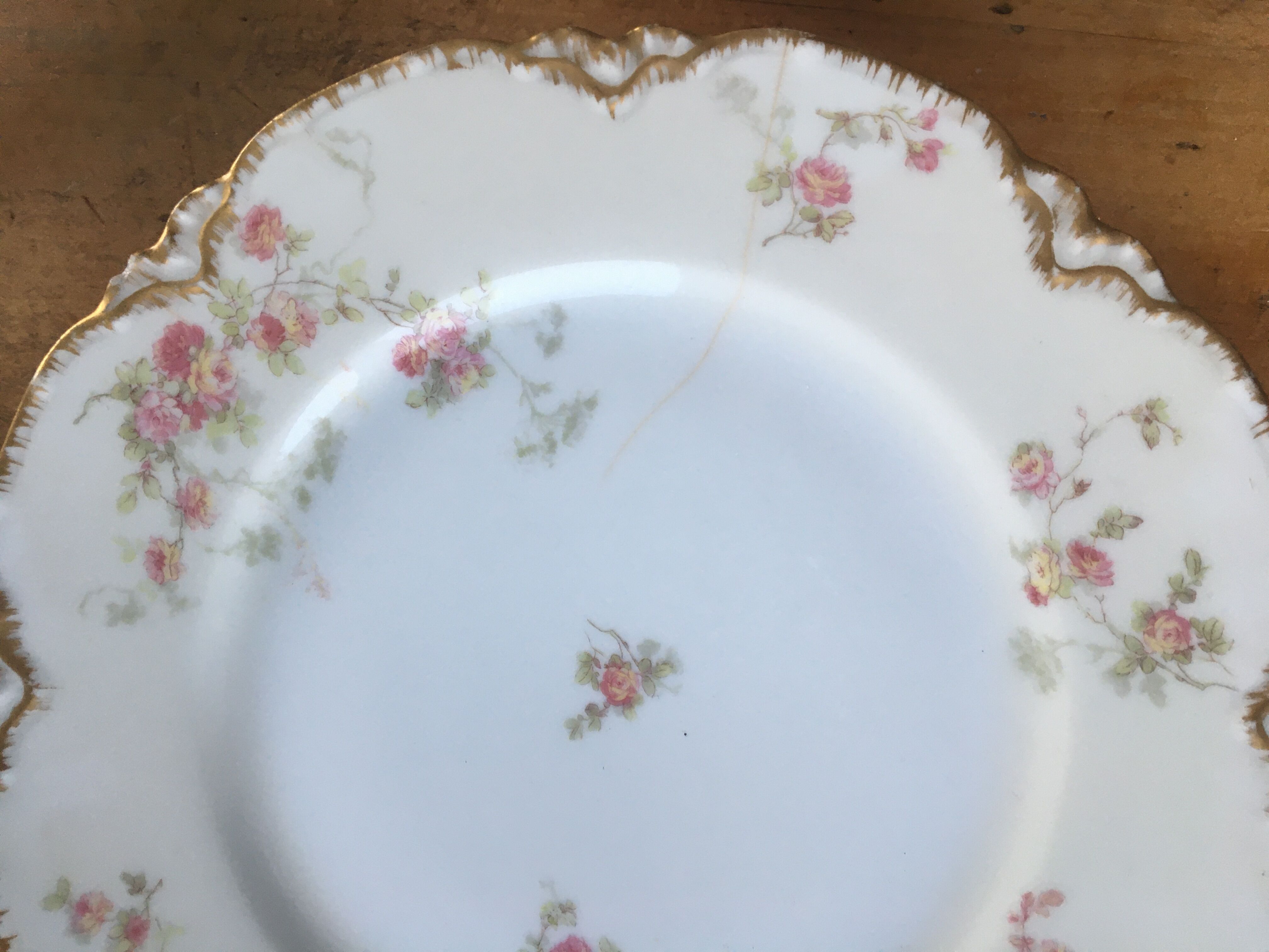 4 Limoges porcelain plates