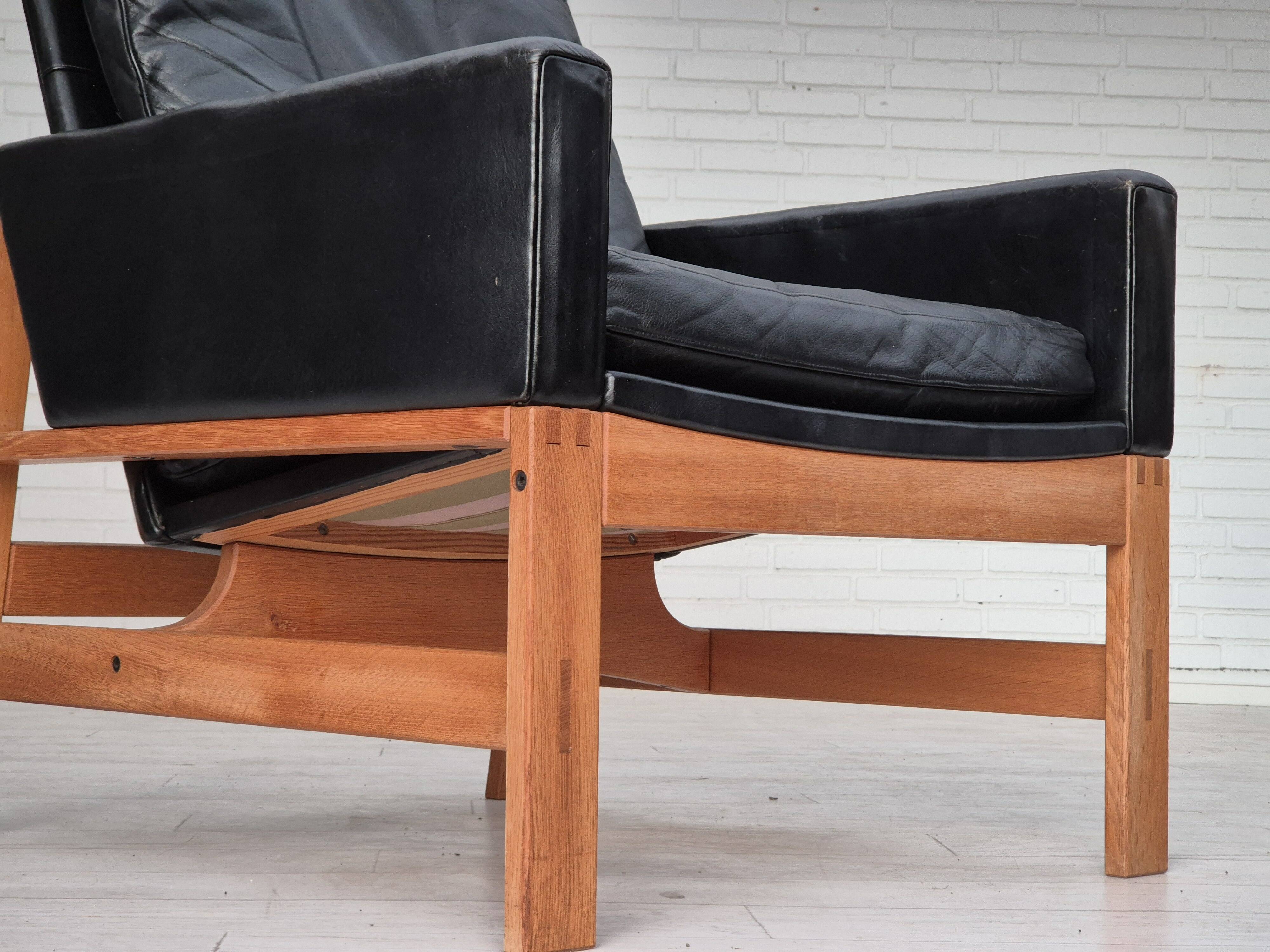 1960s, Danish lounge chair, original condition, furniture leather, solid oak wood.