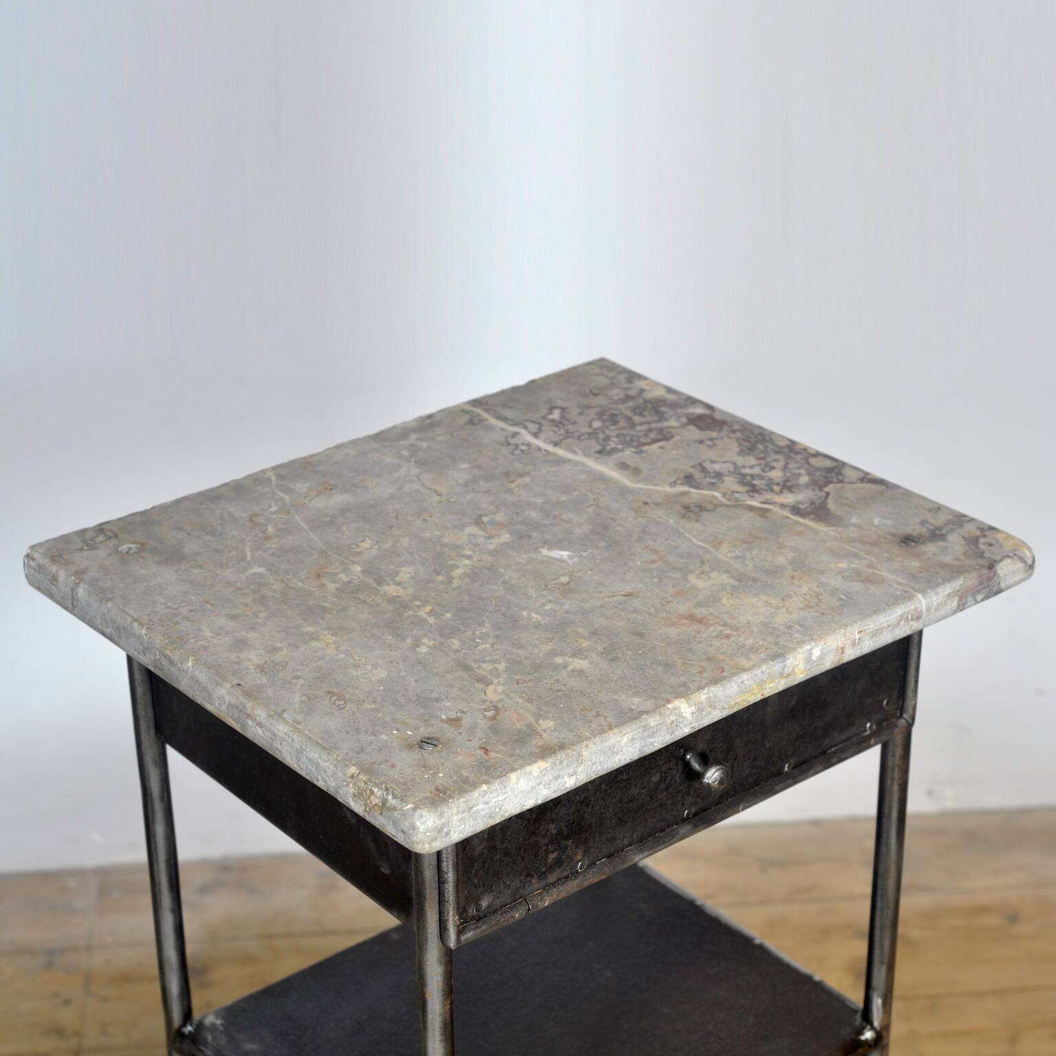 Iron bedside table with marble top, 1910