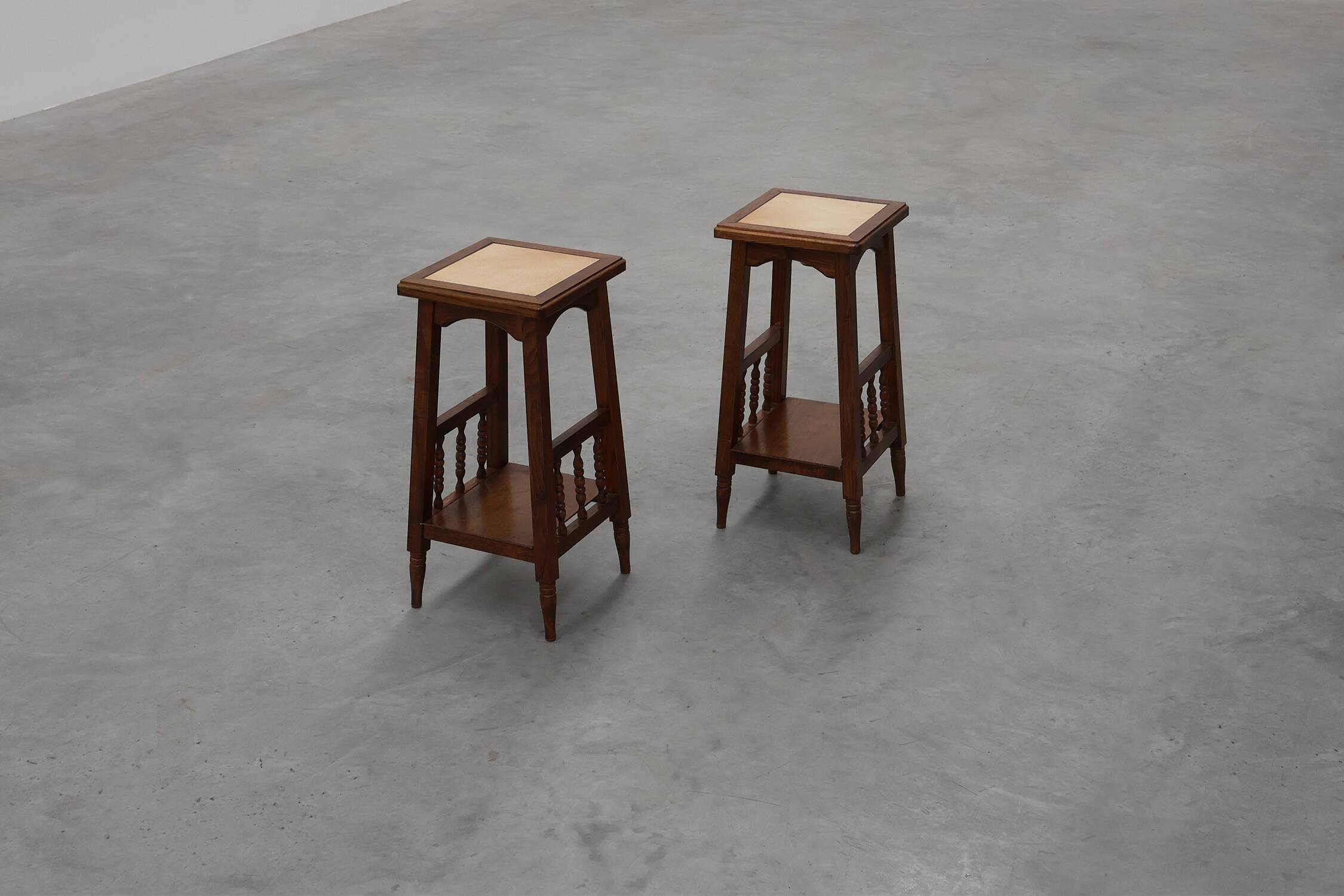 Pair of 20th century rustic wooden side tables with ceramic tile top