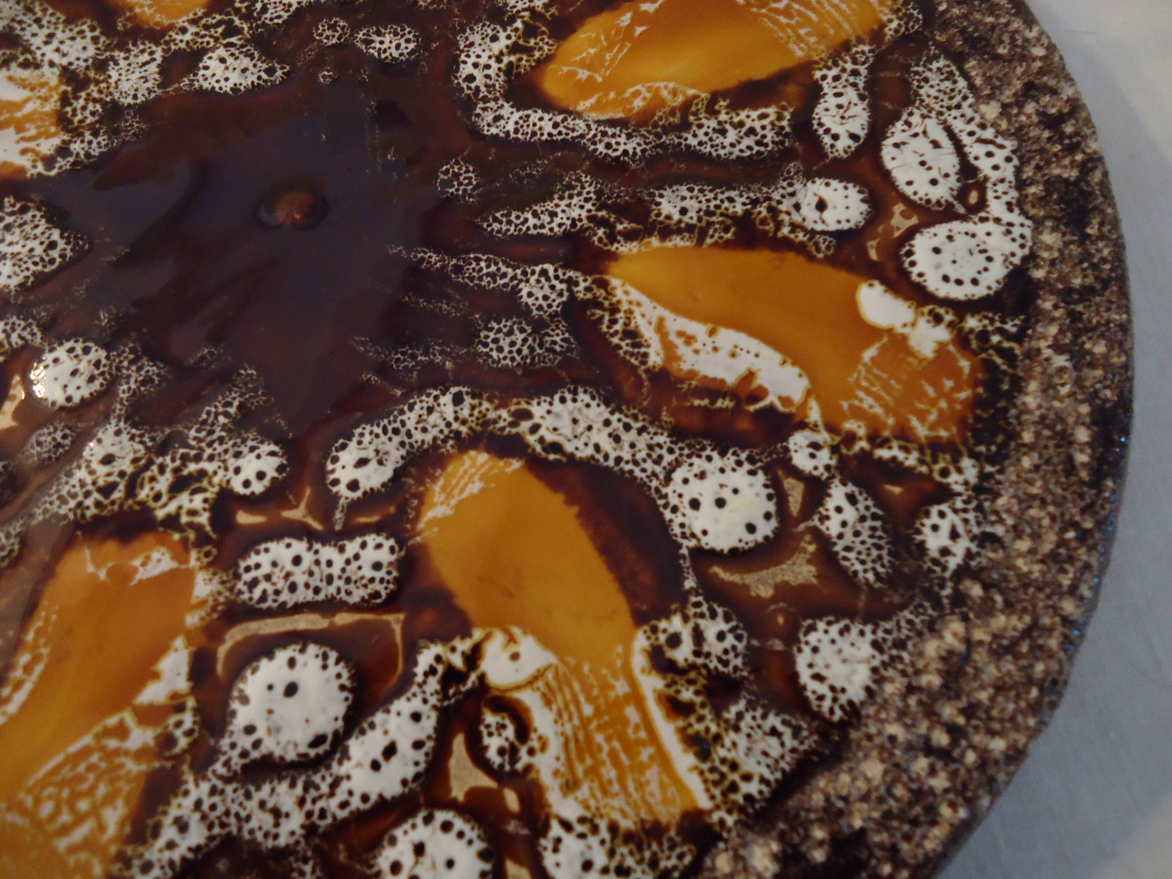 Round plate Vallauris glazed ceramic in brown and orange and Fat Lava A036
